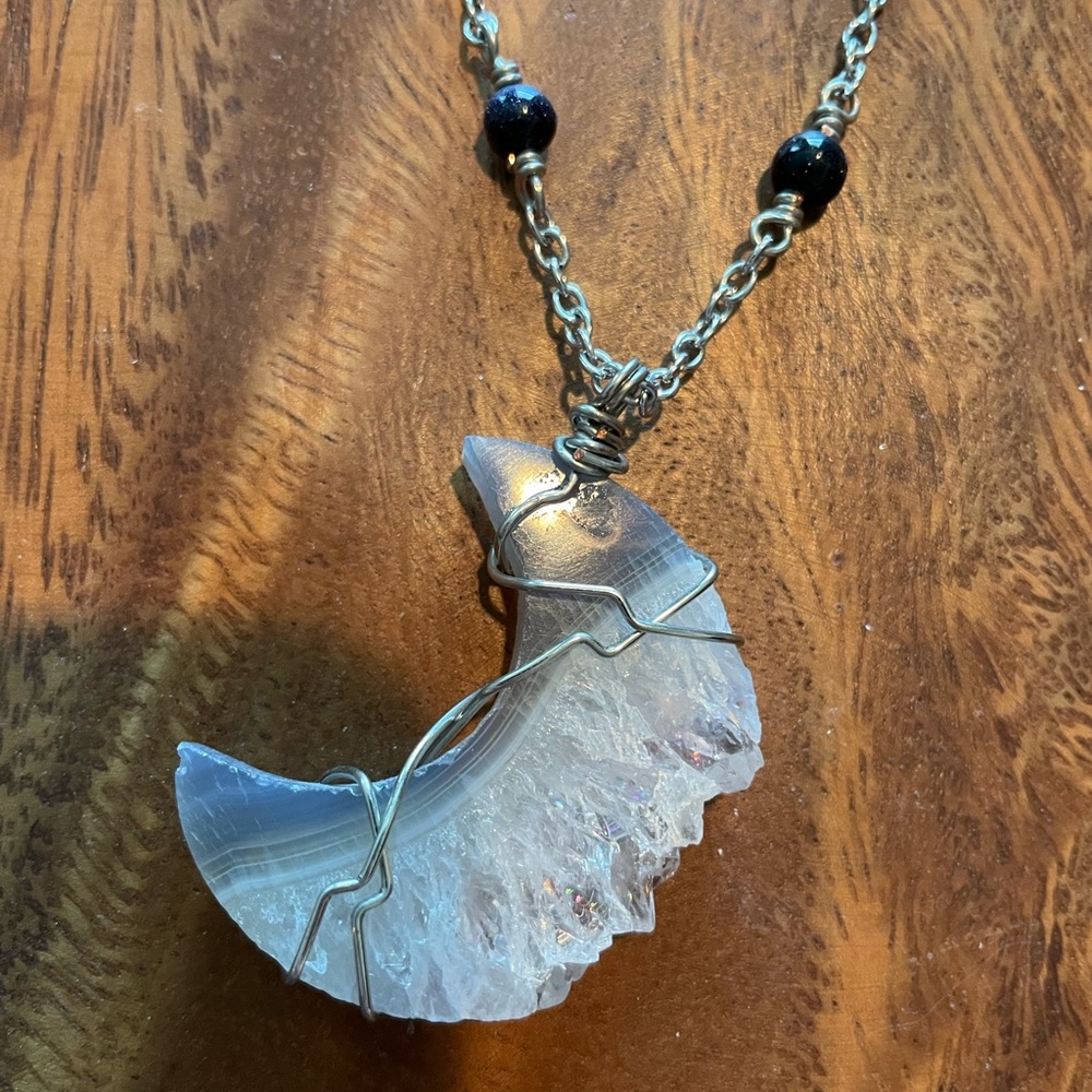 Crystal moon necklace with blue gold stone